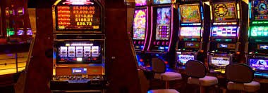 Mobile slot game screen showing spin button and balance